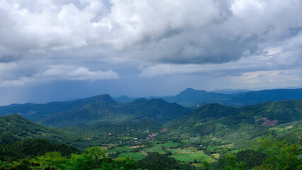 Fototapeta na wymiar Mountain with meadow and blue sky in Thailand.