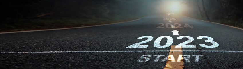 Direction to new year concept and sustainable development idea. Number of 2023 to 2027 on asphalt...