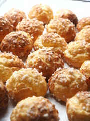 Chouquettes coated with sugar nibs
