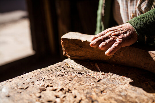 Crop injured hand of carpenter