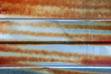 the texture of corrugated rusty metal