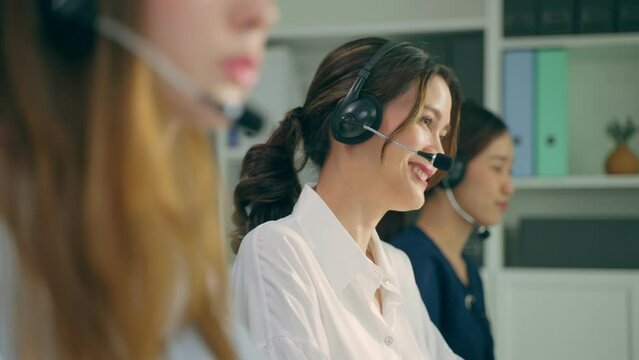 Group of beautiful business woman call center work in office corporate