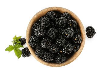 Bowl and fresh ripe blackberries on white background, top view