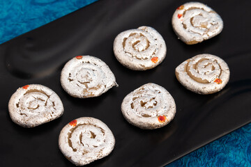 Indian Mithai Kaju Jalebi Also Known As Kaju Katli, Kaju Dilkhush Is Spiral Shaped Sweet Made Of Cashew Nut Powder, Kajoo, Mawa, Mava, Malai, Khoya, Doodh, Badam, Khoa, Badaam, Pista In Sugar Syrup