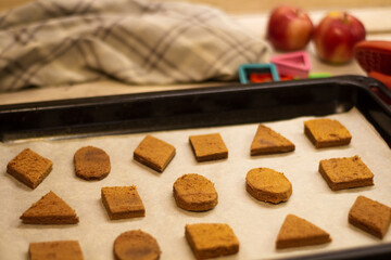 Geometric shaped cookies on baking paper