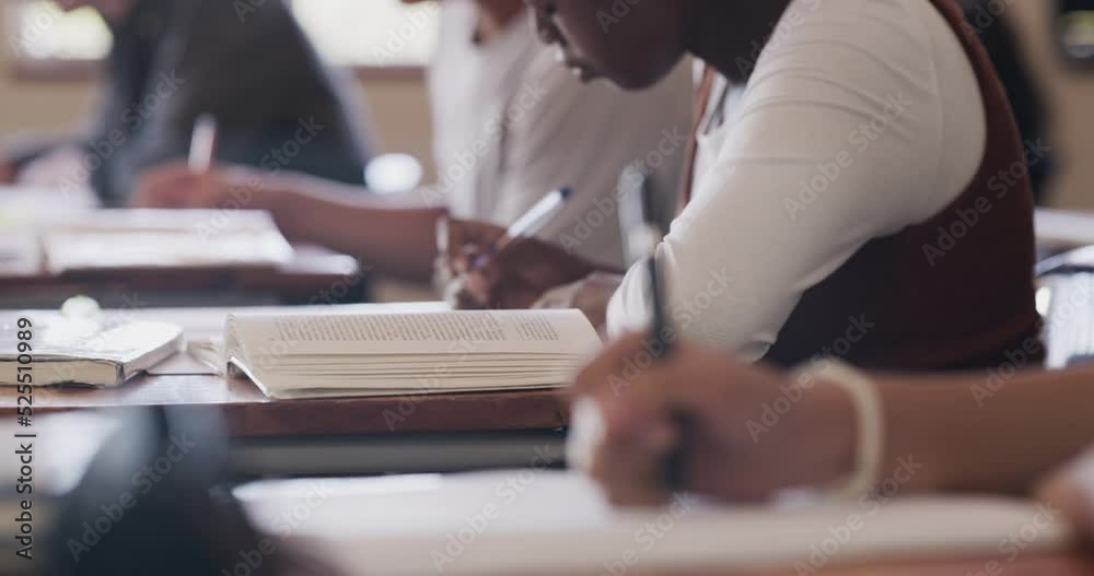 Aufkleber Writing, education and study in classroom of students working in their notebook at their desk for quiz test. High school children learning and reading at desk for exam mindset preparation