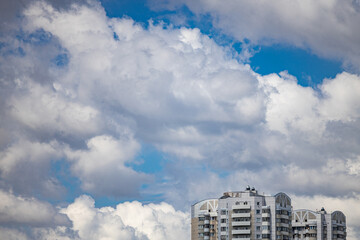 Fototapeta premium upper floors of the house against the cloudy sky