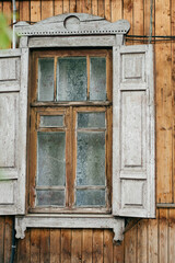 Obraz na płótnie Canvas old wooden window with shutters
