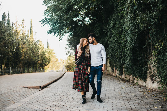 young affectionate couple in the street