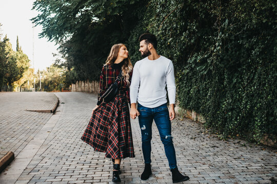 young affectionate couple in the street