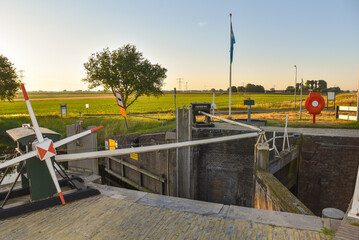 Oudesluis, Netherlands. August 2022. A small manually operated lock in the polder of North Holland.