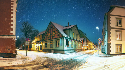 Parnu, Estonia. Night View Of Kuninga Street With Old Buildings, Wooden Houses, Restaurants, Cafe,...