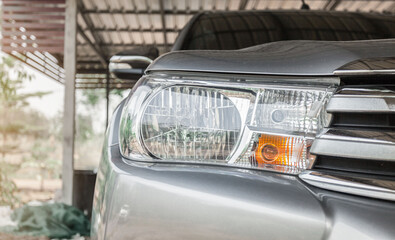 Obraz premium Details about headlights of a Gray modern car close up. Rear lights of a new sports car. LED Tail light of a new luxury car.