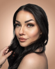 Portrait of a beautiful woman wearing makeup showing eyelashes