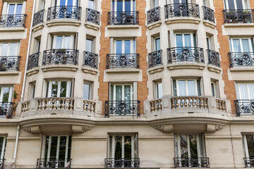 Fragment of an ancient fountain in Paris close-up in daylight.