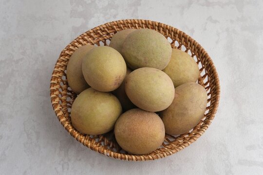 Sapodilla fruit (Manilkara zapota) and other names such as sapota, chikoo, chico, sawo, naseberry, or nispero.