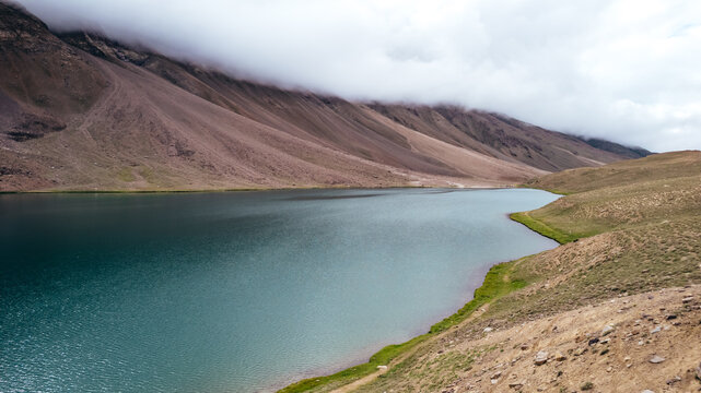 Beautiful blue landscape of Chandra Taal Lake on cloudy day in Spiti Valley