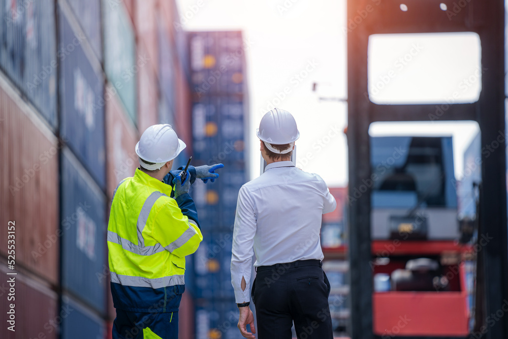 Poster professional container yard workers and co-worker having discussion on working plan together,cargo s