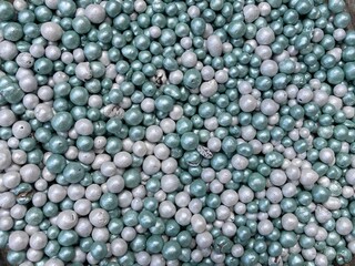 White and blue beads on a heap