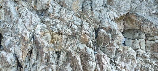 stone texture. a natural stone. texture of sea rocks. sea ​​shore. rocks.
