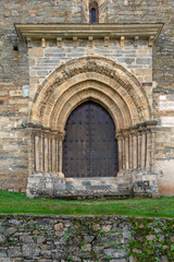 Door of forgiveness of the Santiago romanesque church of Villafranca in the way of Santiago trekking. Spain.