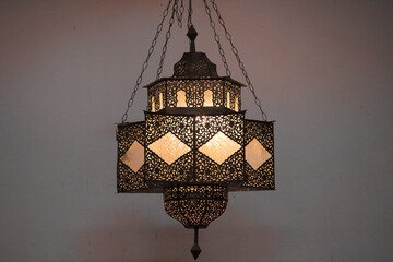 Morocco Ornate metal lamp in the wall of a mosque, Morocco style lamp or lantern. Morocco Morocco...