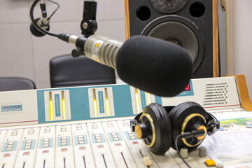 microphone and headphone in radio station studio  on air