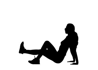 Silhouette of young woman in gym 