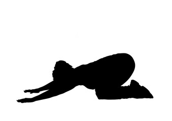 Silhouette of woman practicing yoga 