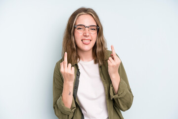 caucasian pretty woman feeling provocative, aggressive and obscene, flipping the middle finger,...