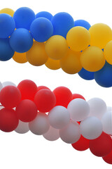 A bunch of balloons with symbols of the flag of Ukraine and Poland