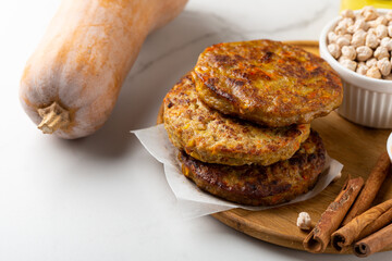 Pumpkin vegan fritters and raw ingredients food copy space