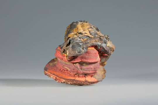 Goethite acicular iron ore. Limonite iron oxide hydrates. Museum Mineral Series. Orange yellow brown mineralogical sample