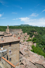 Fototapeta na wymiar Tuscany, Italy. Panoramic view of the medieval hill town of Sorano. Etruscan towns of Tuscany. Towns that have existed for the second millennium. Ancient Sorano