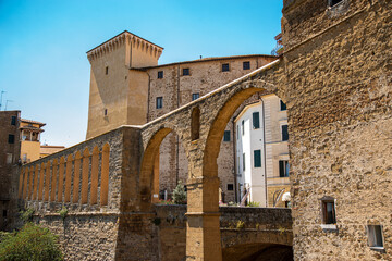 Tuscany, Italy. Ancient aqueducts of the medieval hill town of Pitigliano. Etruscan towns of...