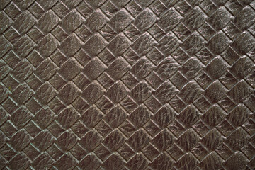 Brown braided leather texture. Brown texture for background.