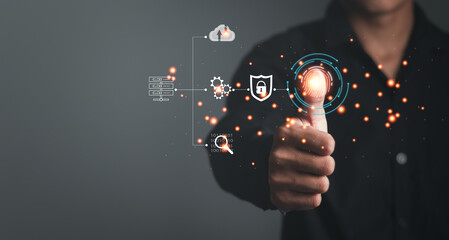 Man scans fingerprint to unlock and access business information network. Biometric identification and cybersecurity protect business transactions from digital cyberattacks online.