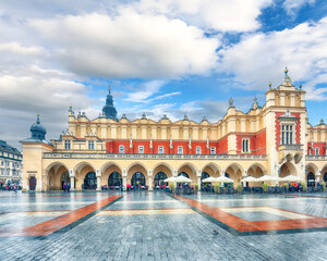 Naklejka na ściany i meble Astonishing cityscape of Krakow with Cloth Hall, Sukiennice and Townhouse tower on Main square.