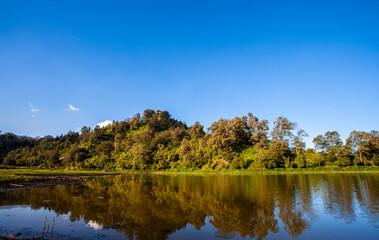Fototapeta na wymiar The beauty of Ranu Pani, the lake at the foot of Mount Semeru, is the starting point for climbing to Mount Semeru in Lumajang Regency, Indonesia. Part of the Bromo Tengger Semeru National Park.