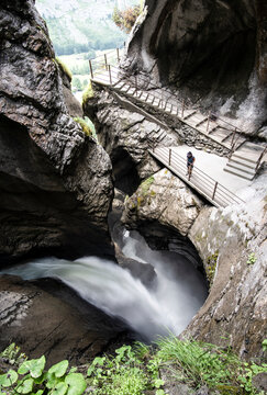 Woman looking at Waterfall, Tr&uuml;mmelbachf&auml;lle, Switzerland
