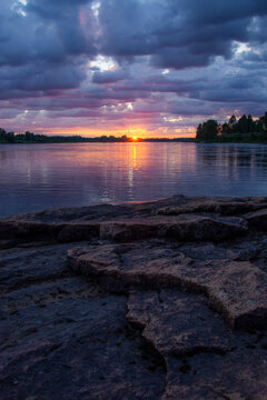 Sunrise over Kattilakoski Rapids on Torne River during Midnight sun, Sweden