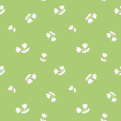 Ditsy daisy floral seamless pattern. Small flowers on green background repeat print. White flowers design on lime green background for wallpaper, wrapping, fabric, textile, decoration.