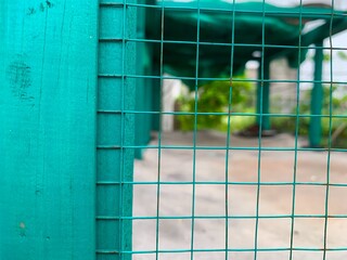Wooden cage with fence 