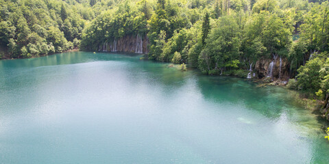 Beautiful paradise. Blue lake and waterfall in the forest, Plitvice lakes, Croatia.