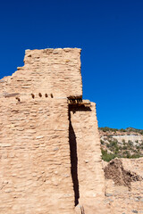 Historic mission church ruins with blue sky
