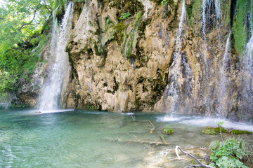 Beautiful paradise. Blue lake and waterfall in the forest, Plitvice lakes, Croatia.