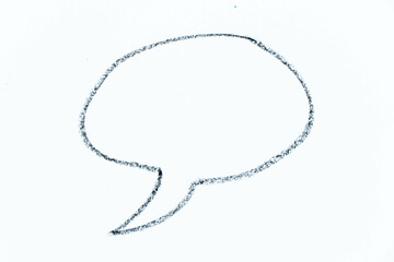 black color oil pastel hand drawing in round speech banner shape on white paper background with copy space