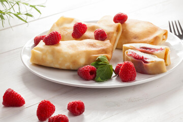 Pancake with cheese and raspberries.Pancake with cheese.Pancake with cheese