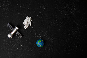 astronaut and Earth on space background