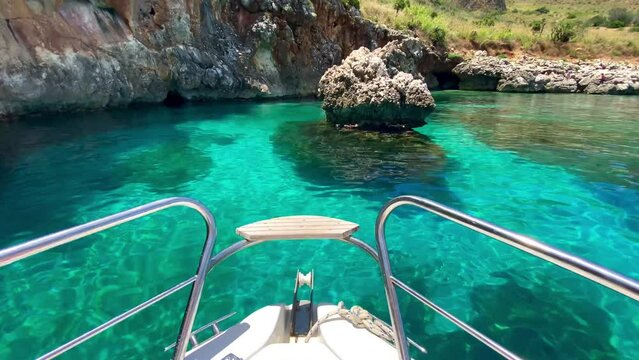 view from the boat the clear sea of the Zingaro reserve in the province of Trapani in Sicily